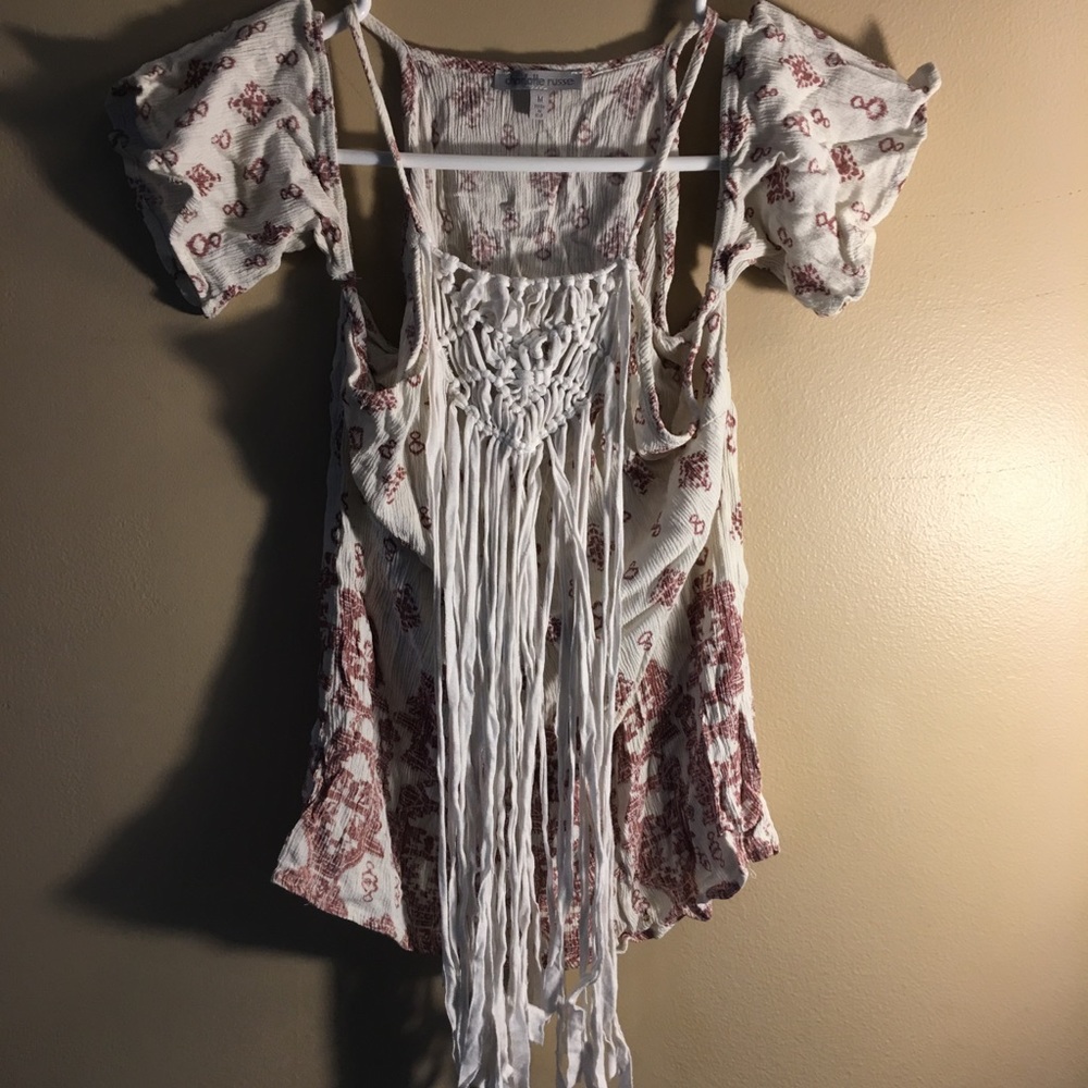 Open shoulder top with fringe